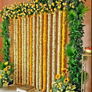 Yasvi Traditional Haldi Stage Decor with Marigold & Yellow Roses