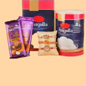 Yasvi Sweet Affection Rakhi Hamper – 3 Rakhis, 2 Silk & 1kg Rasgulla